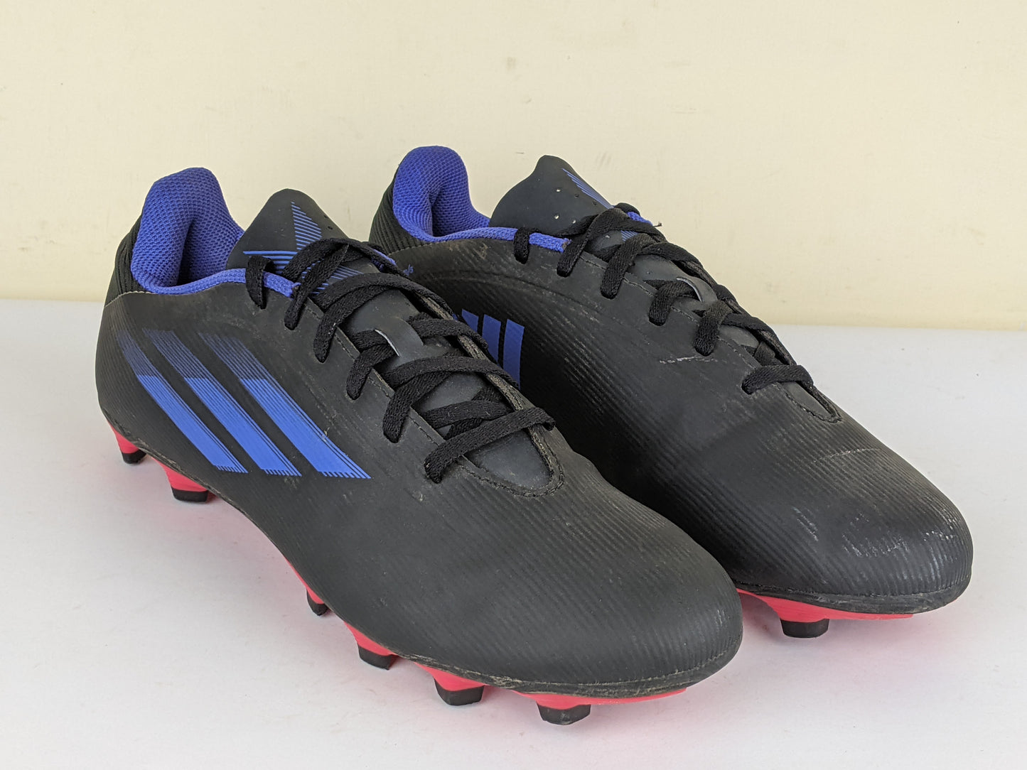 adidas X Speedflow .4 FG Edge of Darkness - Core Black/Sonic Ink/Solar Yellow