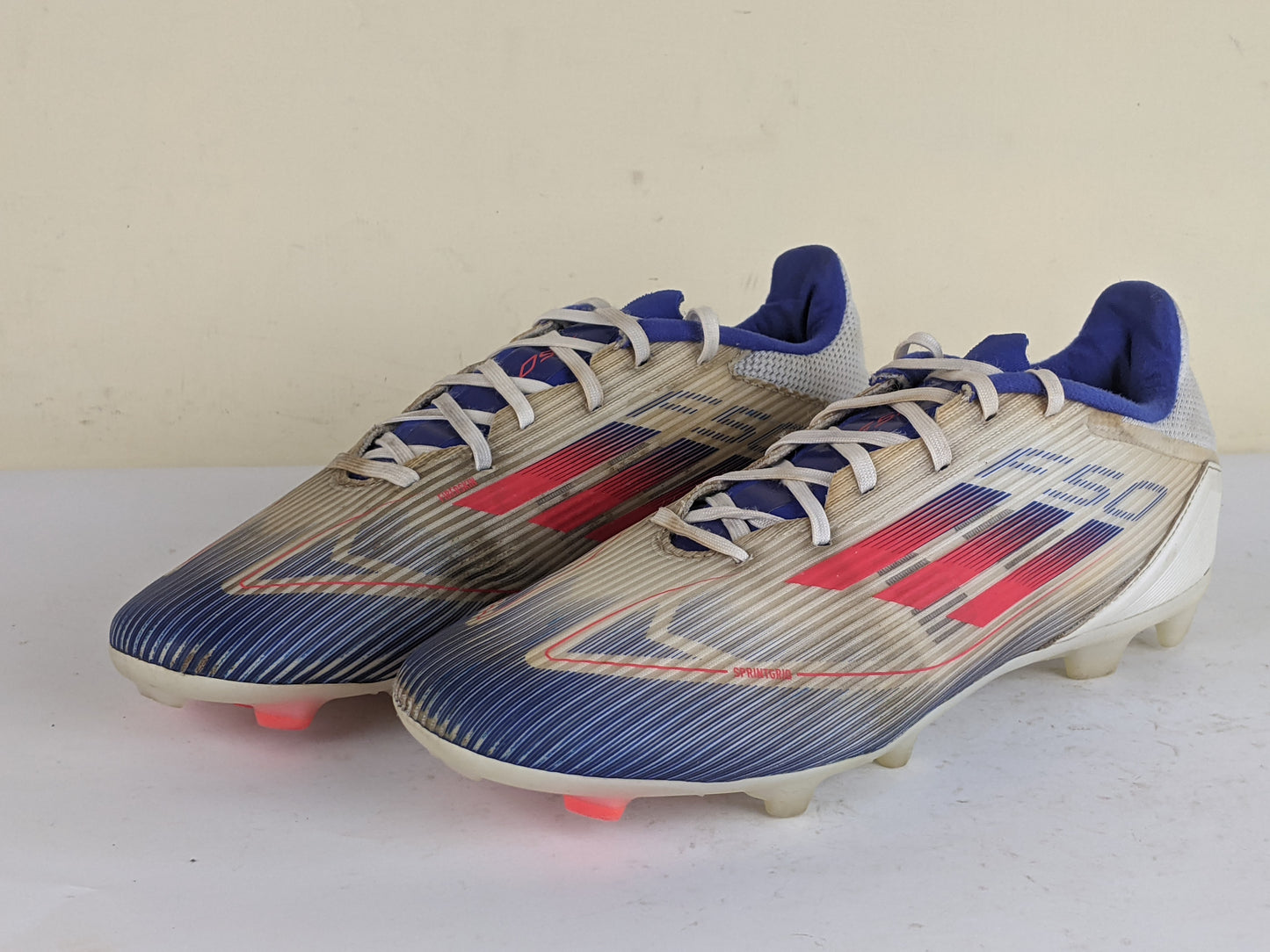 adidas F50 League FG/AG Advancement - Footwear White/Solar Red/Lucid Blue