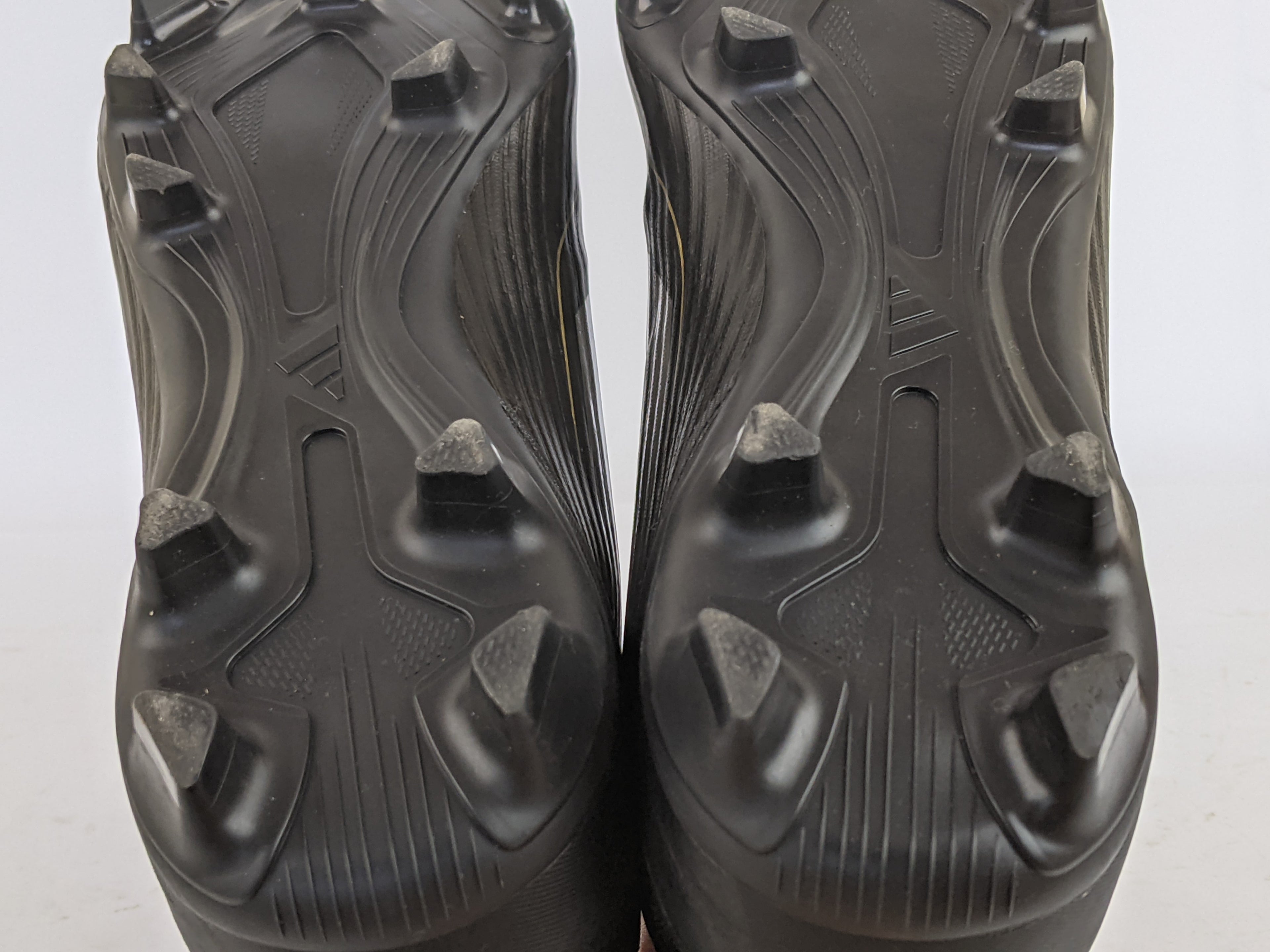 adidas F50 Club FxG Dark Spark - Core Black/Iron Metal/Gold Metallic