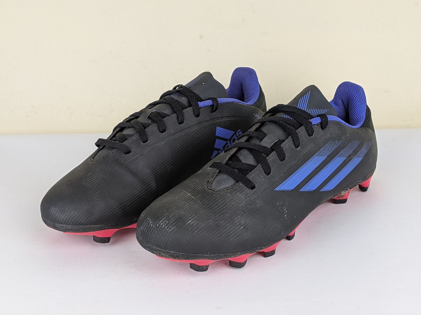 adidas X Speedflow .4 FG Edge of Darkness - Core Black/Sonic Ink/Solar Yellow
